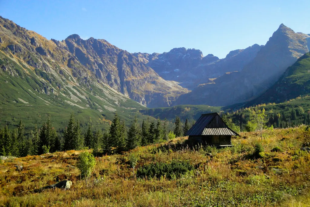 Tatra mountains with a wooden hut in the valley